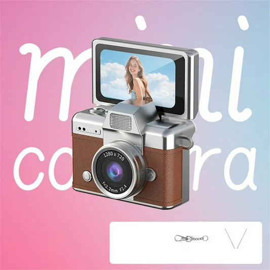A mini, compact digital camera with a 1.47-inch LCD screen.