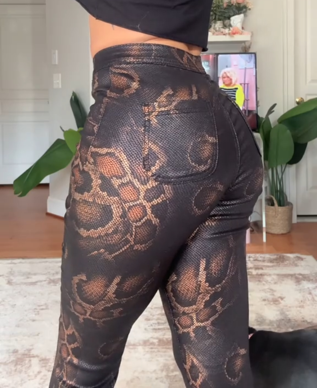 Snake-print stretch flared pants