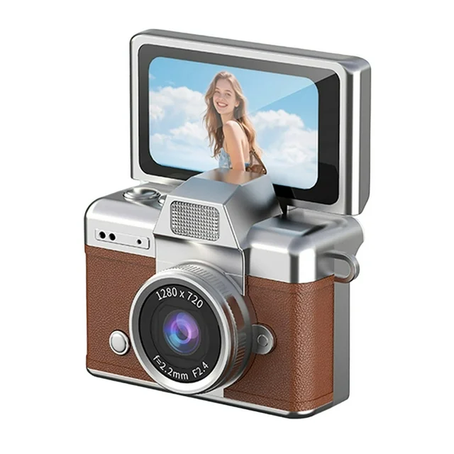 A mini, compact digital camera with a 1.47-inch LCD screen.