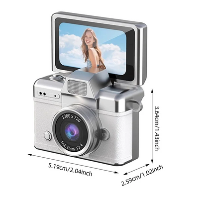A mini, compact digital camera with a 1.47-inch LCD screen.